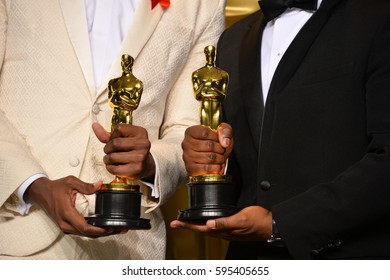 LOS ANGELES, CA. February 26, 2017: Winners holding their Oscar trophies in the photo room at the 89th Annual Academy Awards at the Dolby Theatre, Los Angeles. 