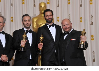 LOS ANGELES, CA - FEBRUARY 27, 2011: The King's Speech Producers Iain Canning & Emile Sherman & Gareth Unwin At The 83rd Academy Awards At The Kodak Theatre, Hollywood.
