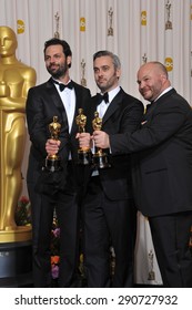 LOS ANGELES, CA - FEBRUARY 27, 2011: The King's Speech Producers Iain Canning & Emile Sherman & Gareth Unwin At The 83rd Academy Awards At The Kodak Theatre, Hollywood.
