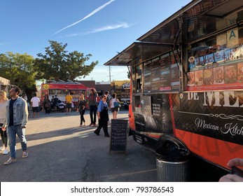 Los Angeles, CA: January 13, 2017:  Food Trucks And Crowd Of Patrons In A Parking Lot In The Los Feliz Area Of Los Angeles.  Food Trucks Have Become Very Popular For Many Americans In Recent Years.