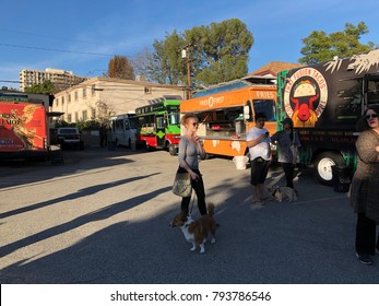 Los Angeles, CA: January 13, 2017:  Food Trucks And Crowd Of Patrons In A Parking Lot In The Los Feliz Area Of Los Angeles.  Food Trucks Have Become Very Popular For Many Americans In Recent Years.