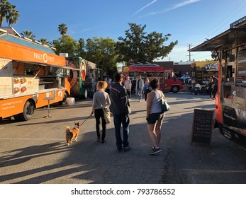 Los Angeles, CA: January 13, 2017:  Food Trucks And Crowd Of Patrons In A Parking Lot In The Los Feliz Area Of Los Angeles.  Food Trucks Have Become Very Popular For Many Americans In Recent Years.