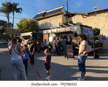 Los Angeles, CA: January 13, 2017:  Food Trucks And Crowd Of Patrons In A Parking Lot In The Los Feliz Area Of Los Angeles.  Food Trucks Have Become Very Popular For Many Americans In Recent Years.