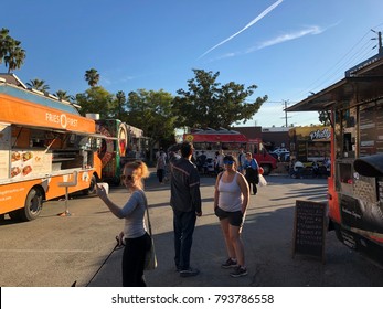 Los Angeles, CA: January 13, 2017:  Food Trucks And Crowd Of Patrons In A Parking Lot In The Los Feliz Area Of Los Angeles.  Food Trucks Have Become Very Popular For Many Americans In Recent Years.