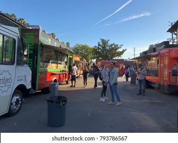 Los Angeles, CA: January 13, 2017:  Food Trucks And Crowd Of Patrons In A Parking Lot In The Los Feliz Area Of Los Angeles.  Food Trucks Have Become Very Popular For Many Americans In Recent Years.