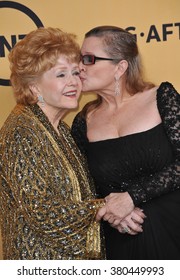 LOS ANGELES, CA - JANUARY 25, 2015: Debbie Reynolds & daughter Carrie Fisher at the 2015 Screen Actors Guild  Awards at the Shrine Auditorium.