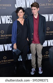 LOS ANGELES, CA. January 30, 2017: Actress Carrie-Ann Moss & son Owen Roy at the premiere of "John Wick Chapter Two" at the Arclight Theatre, Hollywood.