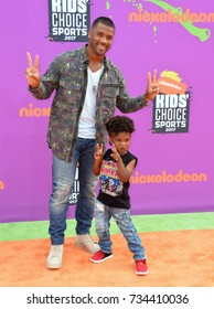 LOS ANGELES, CA - July 13, 2017: Russell Wilson & Guest At Nickelodeon's Kids' Choice Sports 2017 At UCLA's Pauley Pavilion.