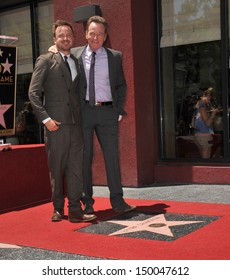 LOS ANGELES, CA - JULY 16, 2013: Bryan Cranston & his Breaking Bad co-star Aaron Paul presented with the 2,502nd star on the Hollywood Walk of Fame. 