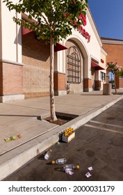 Los Angeles, CA - June 19 2021:  Empty Wine Bottles In The Parking Lot Of A CVS On A Saturday Morning