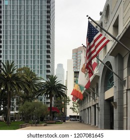 LOS ANGELES, CA, JUNE 2018: View Of US Bank Tower From Park Outside The Fashion Institute Of Design And Merchandising In Downtown, Los Angeles. Various Flags Flying In Foreground