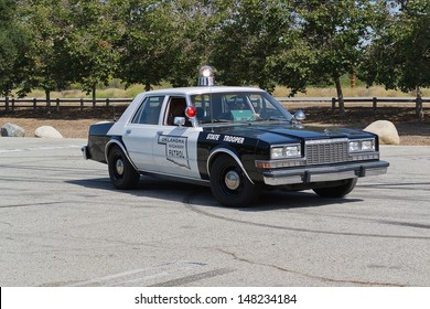 LOS ANGELES, CA. -  JUNE 29 : American Heroes Air Show - Old Vehicle Oklahoma Highway Patrol  On June 29, 2013 In Los Angeles, CA.