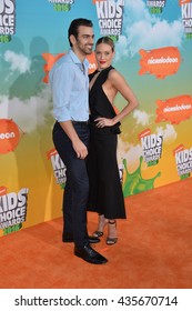 LOS ANGELES, CA - MARCH 12, 2016: Dancer Peta Murgatroyd & Actor Nyle DiMarco At The 2016 Kids' Choice Awards At The Forum, Los Angeles.
