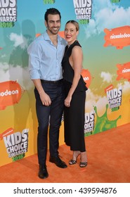 LOS ANGELES, CA - MARCH 12, 2016: Dancer Peta Murgatroyd & Actor Nyle DiMarco At The 2016 Kids' Choice Awards At The Forum, Los Angeles.
