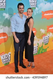 LOS ANGELES, CA - MARCH 12, 2016: Dancer Peta Murgatroyd & Actor Nyle DiMarco At The 2016 Kids' Choice Awards At The Forum, Los Angeles.
