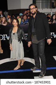 LOS ANGELES, CA - MARCH 18, 2014: Lisa Bonet & Jason Momoa at the Los Angeles premiere of "Divergent" at the Regency Bruin Theatre, Westwood. 