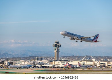 Los Angeles, CA: March 23, 2018: An American Airlines jet takes off at Los Angeles International Airport (LAX). American Airlines began operations in 1936.