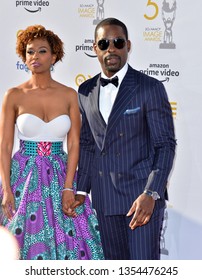 LOS ANGELES, CA. March 30, 2019: Sterling K. Brown & Ryan Michelle Bathe At The 50th NAACP Image Awards.
Picture: Paul Smith/Featureflash