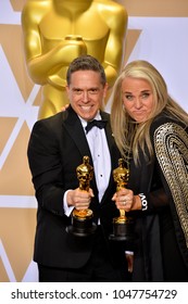 LOS ANGELES, CA - March 4, 2018: Lee Unkrich & Darla K. Anderson At The 90th Academy Awards Awards At The Dolby Theartre, Hollywood