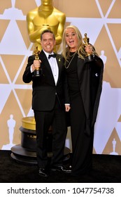 LOS ANGELES, CA - March 4, 2018: Lee Unkrich & Darla K. Anderson At The 90th Academy Awards Awards At The Dolby Theartre, Hollywood