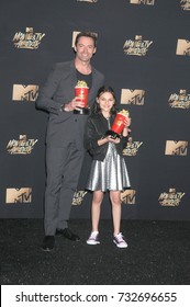 LOS ANGELES, CA - May 07, 2017: Hugh Jackman & Dafne Keen At The 2017 MTV Movie & TV Awards At The Shrine Auditorium