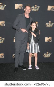 LOS ANGELES, CA - May 07, 2017: Hugh Jackman & Dafne Keen At The 2017 MTV Movie & TV Awards At The Shrine Auditorium