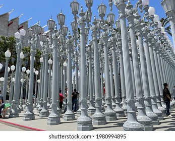 Los Angeles, CA: May 23, 2021:  'Urban Light' is a large-scale assemblage sculpture by Chris Burden at the Los Angeles County Museum of Art. The installation consists of 202 restored street lamps.