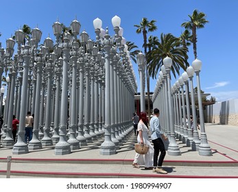 Los Angeles, CA: May 23, 2021:  'Urban Light' is a large-scale assemblage sculpture by Chris Burden at the Los Angeles County Museum of Art. The installation consists of 202 restored street lamps.