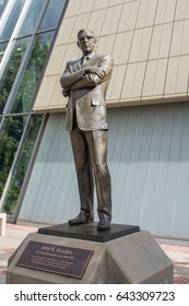 Los Angeles, CA: May 7, 2017:   Statue Of UCLA Coach John Wooden On The UCLA Campus. UCLA Is A Public University Located In The Westwood Area Of Los Angeles.