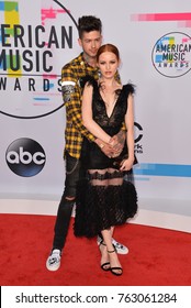 LOS ANGELES, CA - November 19, 2017: Madelaine Petsch & Travis Mills At The 2017 American Music Awards At The Microsoft Theatre LA Live