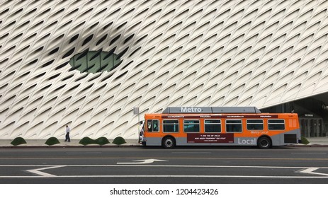 LOS ANGELES, CA, OCT 2018: LA Metro Bus Stopped With Pedestrian Walking Past Outside The Broad Museum In Downtown Los Angeles