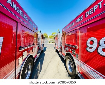 Los Angeles, CA - September 7, 2021: Ultra Wide View Of LAFD Fire Trucks Parked Near Hotel, While Heading To Help Fight Wild Fires. 