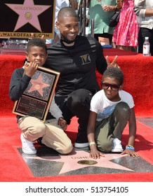 LOS ANGELES, CA. September 7, 2016: Singer/actor Usher & Sons Naviyd Ely Raymond & Usher Raymond V At His Hollywood Walk Of Fame Star Ceremony.