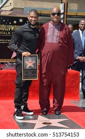 LOS ANGELES, CA. September 7, 2016: Singer/actor Usher & Singer Stevie Wonder At Usher's Hollywood Walk Of Fame Star Ceremony.