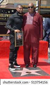 LOS ANGELES, CA. September 7, 2016: Singer/actor Usher & Singer Stevie Wonder At Usher's Hollywood Walk Of Fame Star Ceremony.