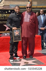 LOS ANGELES, CA. September 7, 2016: Singer/actor Usher & Singer Stevie Wonder At Usher's Hollywood Walk Of Fame Star Ceremony.