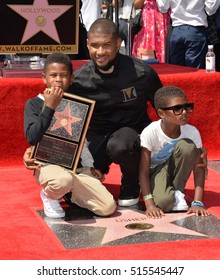 LOS ANGELES, CA. September 7, 2016: Singer/actor Usher & Sons Naviyd Ely Raymond & Usher Raymond V At His Hollywood Walk Of Fame Star Ceremony.