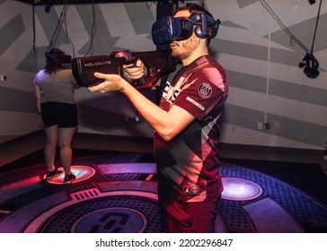 Los Angeles, CA, US 09-10-22 Man Wearing Smart Glasses, Playing VR Game.