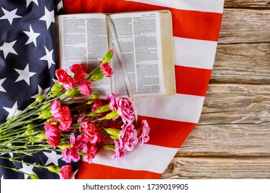 Los Angeles CA US 16 MAY 2020: US Flag With Praying Over A Open Reading Holy Bible Book On A Close Up Of America Pray