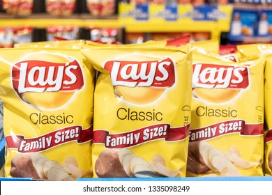 Los Angeles, CA, USA 03/10/2019 Packages Of Frito Lays Brand Potato Chips For Sale At A Supermarket Shelf