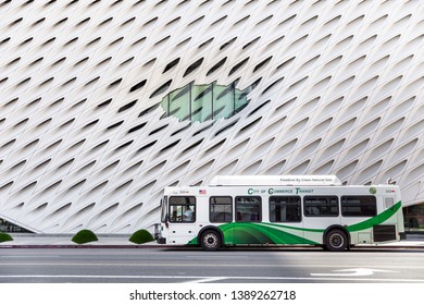 Los Angeles, CA. / USA - April 1, 2019: A Green Energy Eco Bus Parked By The Broad Museum In LA