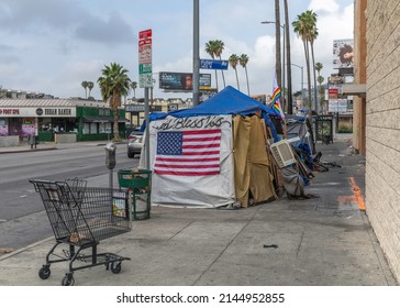 Los Angeles, CA, USA - April 11, 2022:  Homeless encampment on Sunset Boulevard in Los Angeles, CA.