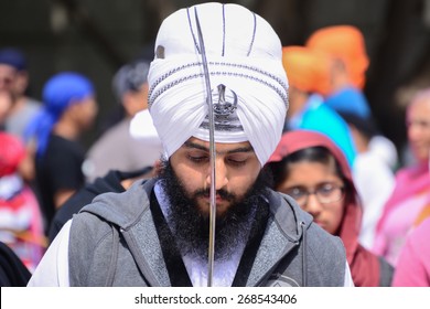 Los Angeles, CA, USA - April 5, 2015: Devotee Sikh With White Turban Recite Prayer At The Anniversary Of Baisakhi Celebration.