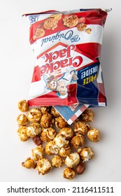 Los Angeles, CA. USA January 31st, 2022 Open Bag Of Cracker Jack Brand Popcorns And Peanuts Snack On White Background From Above