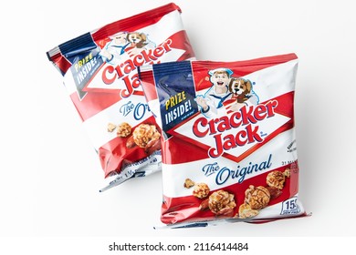 Los Angeles, CA. USA January 31st, 2022 Bags of cracker jack brand popcorns and peanuts snack on white background from above