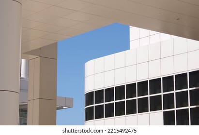 Los Angeles, CA USA - July 14 2022: Image Of The Getty Center Museum. White Tiles, Black Tint Windows, And The Blue Sky.