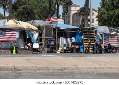 Los Angeles, CA USA - Julyl 3, 2021: Row of tents for homeless veterans surrounding the permieter of the Veterans Administration  and Hospital grounds