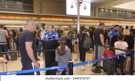 Los Angeles, CA / USA - June 12, 2019: People At TSA Security Passport Checkpoint At Los Angeles International Airport (LAX)                                 