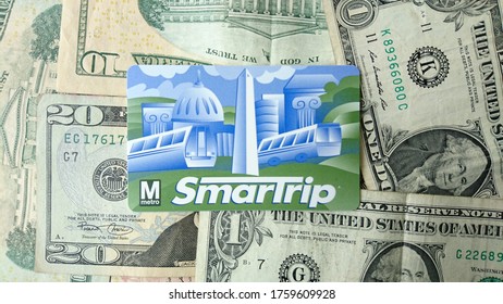 Los Angeles, CA / USA - June 19, 2020: DC Metro SmarTrip Card With US Banknotes As Background