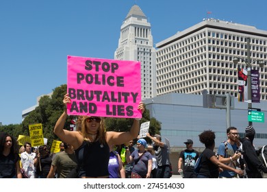 Los Angeles, CA, USA - May 02, 2015: Woman Raising A Sign In March Against The Death Of Freddie Gray, A Man Of Baltimore Who Was Seriously Injured In Police Custody.